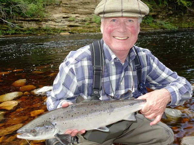 Ian Neale with a cracking fresh Summer grilse from Altyre Estate, River Findhorn