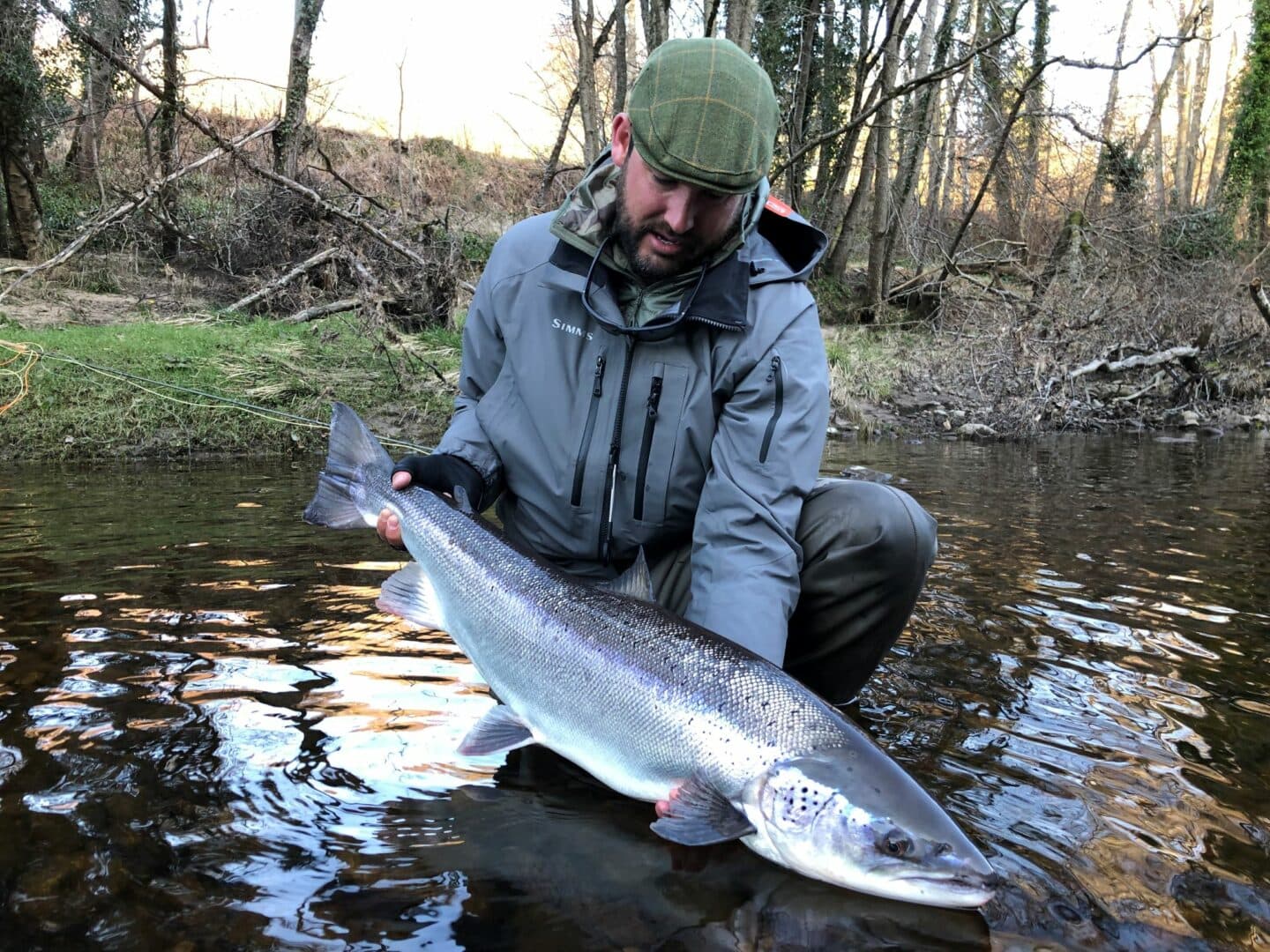 Eugene Burzler holds up his 30 lb Leviathan from Altyre Estate, Lower Beat.