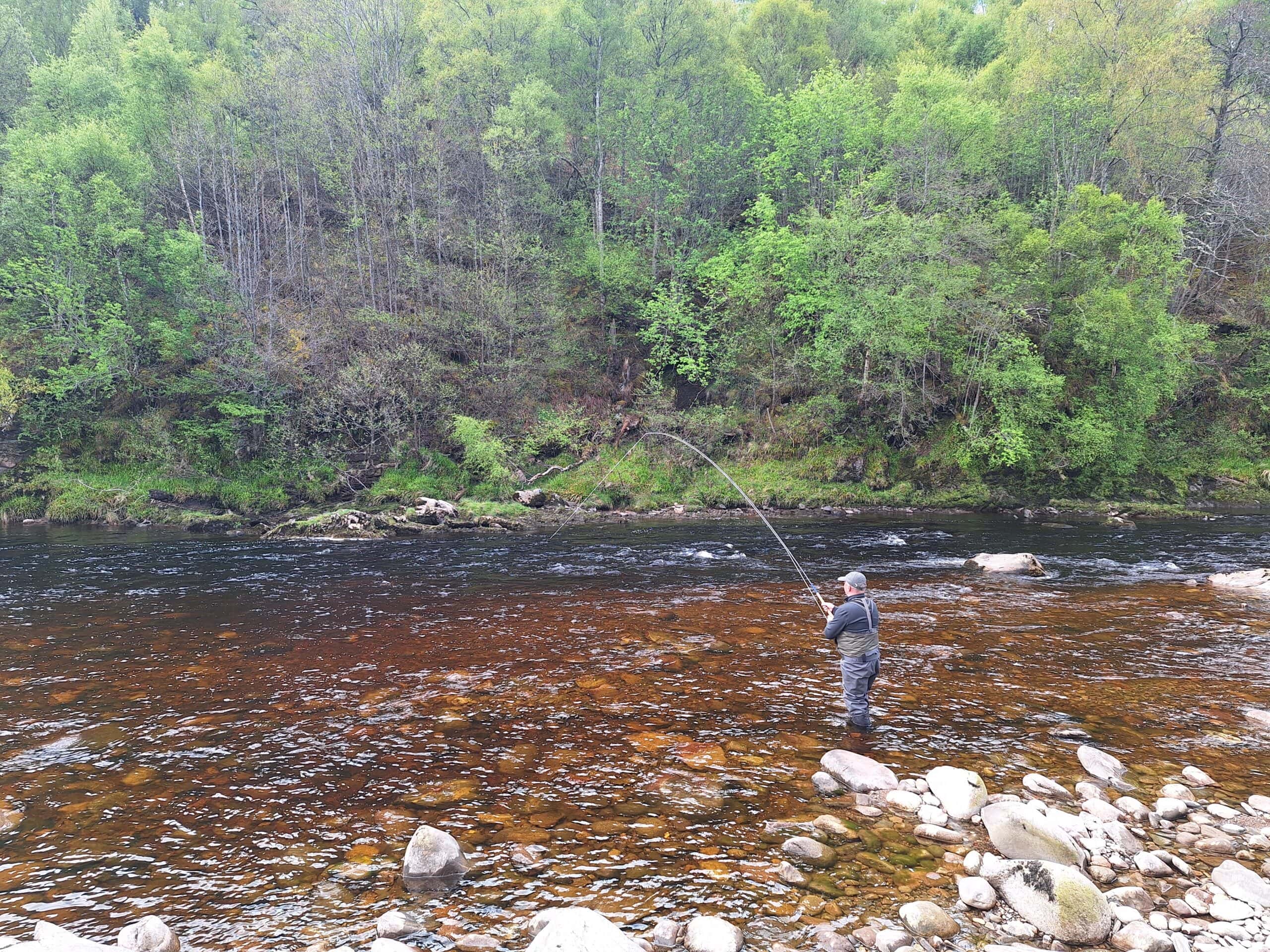 Playing a salmon at Drynachan on the River Findhorn